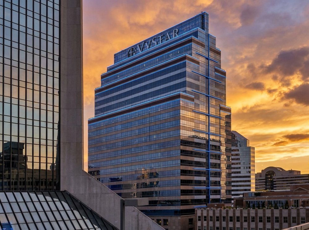 VyStar Tower Jacksonville illuminated at dusk with blue LED accents